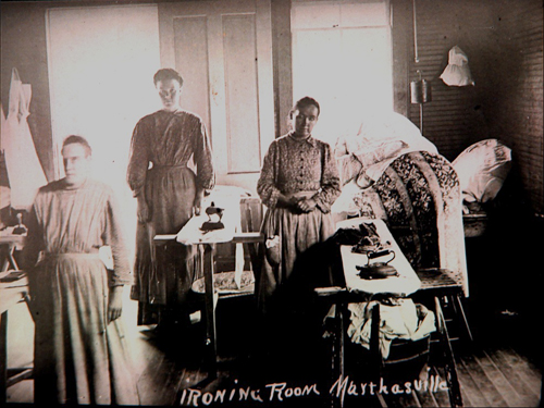 Women ironing clothes