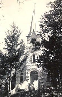 Chapel building from the front surrounded by trees